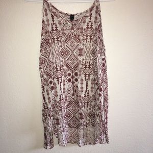 Orange and tan open shoulder shirt